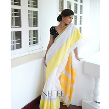 Load image into Gallery viewer, WHITE WITH YELLOW BORDER AND SILVER ZARI COTTON SAREE KDM24-9 - NEITEE